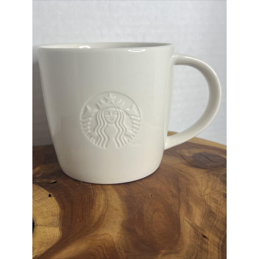 Starbucks 2010 White Embossed Mermaid Ceramic Mug Logo “G” Grande Mug